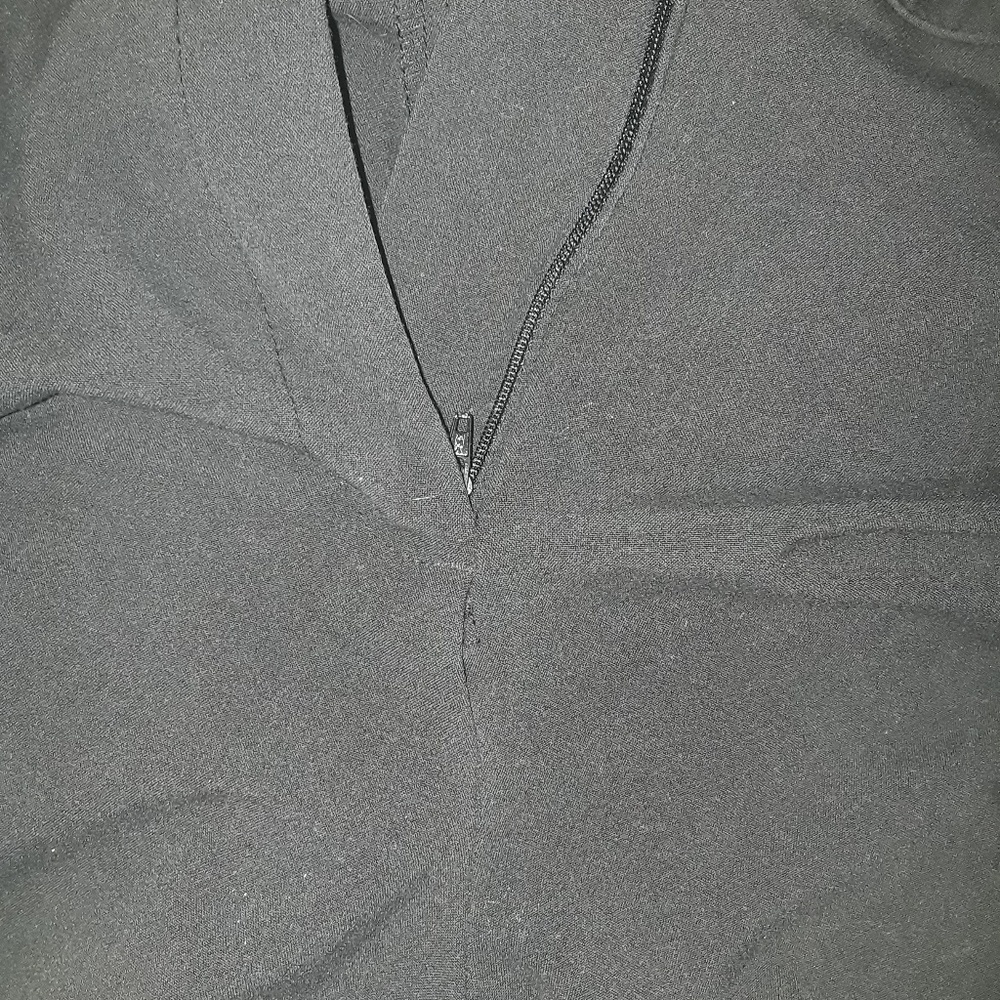 Black slacks.